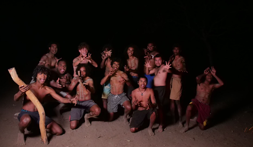 Participants of Adventure Based Indigenous Therapy program gathering at night